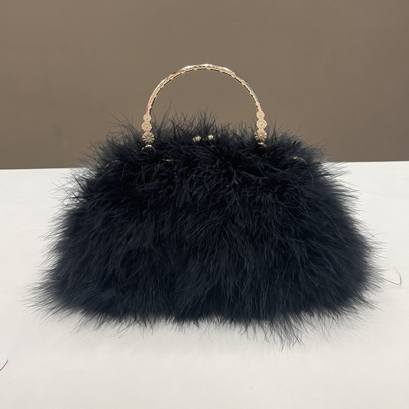 Women's handbags, feather handbags, turkey feather handbags, crossbody handbags, feather bags, handmade bags, real fur bags, handmade fur bags, wholesale and pattern making are available.