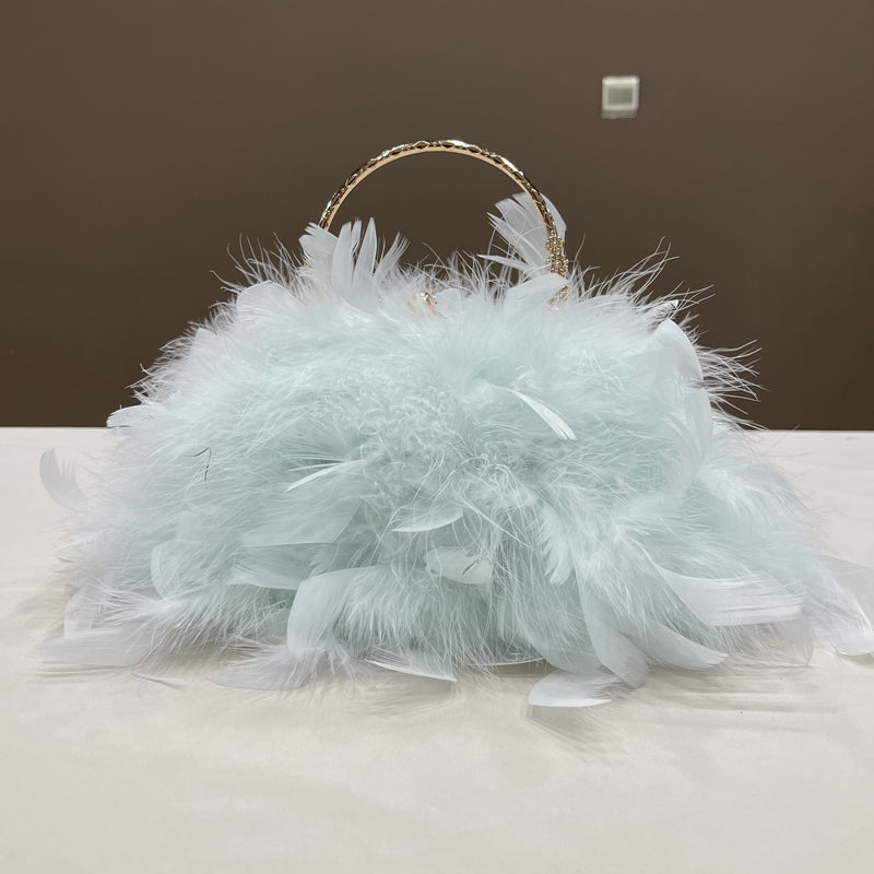 Women's handbags, feather handbags, turkey feather handbags, crossbody handbags, feather bags, handmade bags, real fur bags, handmade fur bags, wholesale and pattern making are available.