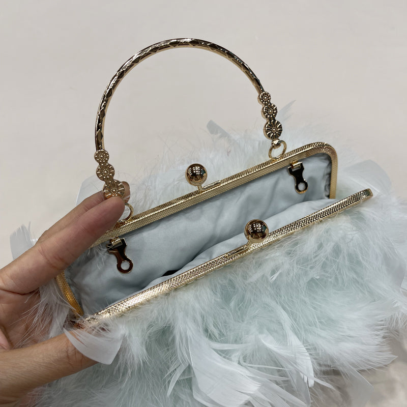 Women's handbags, feather handbags, turkey feather handbags, crossbody handbags, feather bags, handmade bags, real fur bags, handmade fur bags, wholesale and pattern making are available.