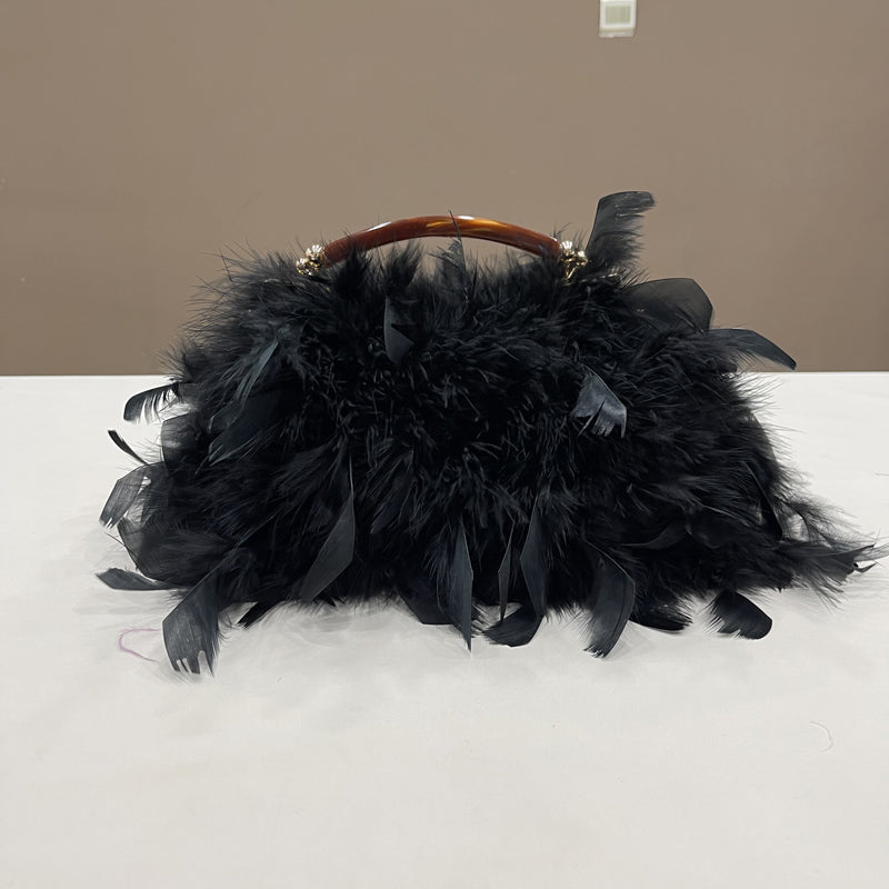 Women's handbags, feather handbags, turkey feather handbags, crossbody handbags, feather bags, handmade bags, real fur bags, handmade fur bags, wholesale and pattern making are available.