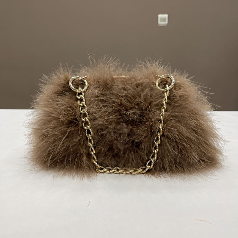 Women's handbags, feather handbags, turkey feather handbags, crossbody handbags, feather bags, handmade bags, real fur bags, handmade fur bags, wholesale and pattern making are available.
