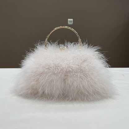 Women's handbags, feather handbags, turkey feather handbags, crossbody handbags, feather bags, handmade bags, real fur bags, handmade fur bags, wholesale and pattern making are available.