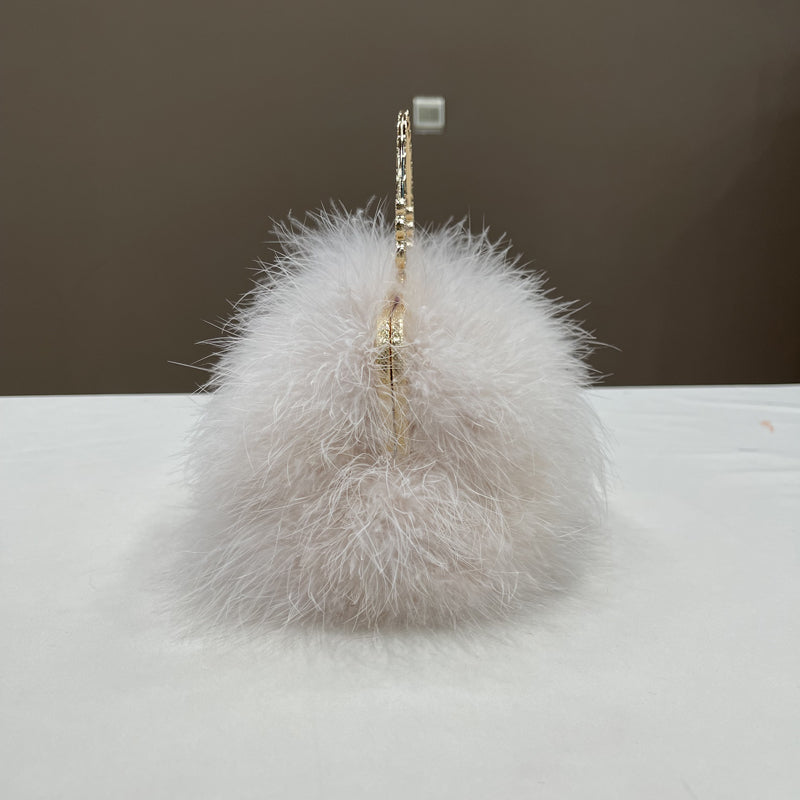 Women's handbags, feather handbags, turkey feather handbags, crossbody handbags, feather bags, handmade bags, real fur bags, handmade fur bags, wholesale and pattern making are available.