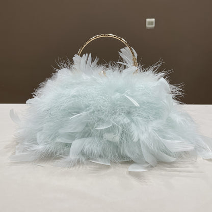 Women's handbags, feather handbags, turkey feather handbags, crossbody handbags, feather bags, handmade bags, real fur bags, handmade fur bags, wholesale and pattern making are available.