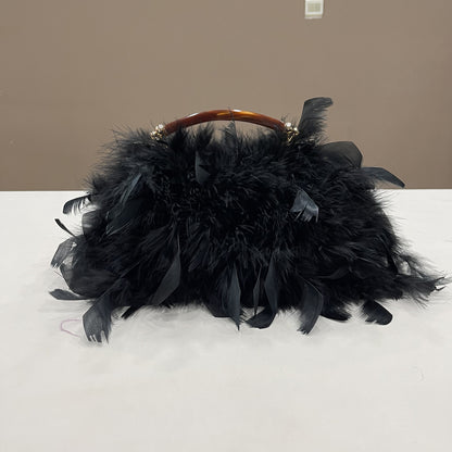 Women's handbags, feather handbags, turkey feather handbags, crossbody handbags, feather bags, handmade bags, real fur bags, handmade fur bags, wholesale and pattern making are available.