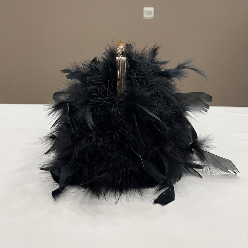 Women's handbags, feather handbags, turkey feather handbags, crossbody handbags, feather bags, handmade bags, real fur bags, handmade fur bags, wholesale and pattern making are available.