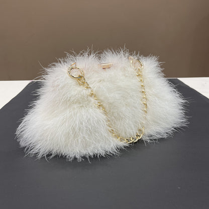 Women's handbags, feather handbags, turkey feather handbags, crossbody handbags, feather bags, handmade bags, real fur bags, handmade fur bags, wholesale and pattern making are available.