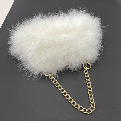 Women's handbags, feather handbags, turkey feather handbags, crossbody handbags, feather bags, handmade bags, real fur bags, handmade fur bags, wholesale and pattern making are available.